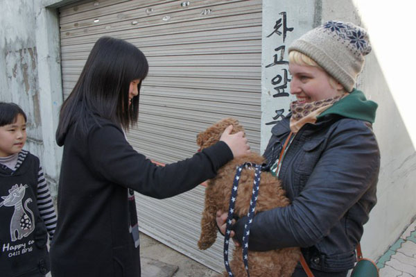 Brave girl and kind poodles.jpg